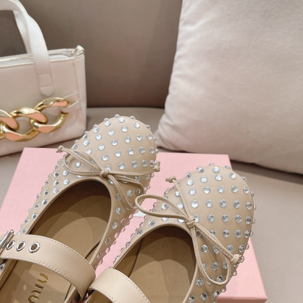 MIUMIU LEATHER BALLERINAS IN BEIGE
