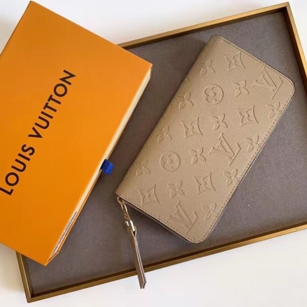 LOUIS VUITTON ZIPPY WALLET MONOGRAM EMPREINTE TURTLEDOVE 19CM M69034