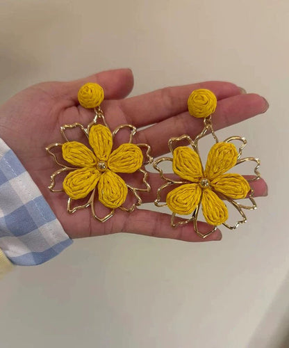 Stylish Yellow Alloy Weavin Hollow Out Floral Drop Earrings
