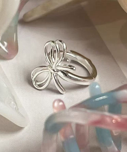 Simple Silk Sterling Silver Bow Hollow Out Hoop Earrings