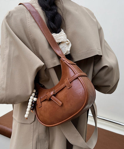 Unique Brown Tasseled Solid Durable Faux Leather Saddle Bag
