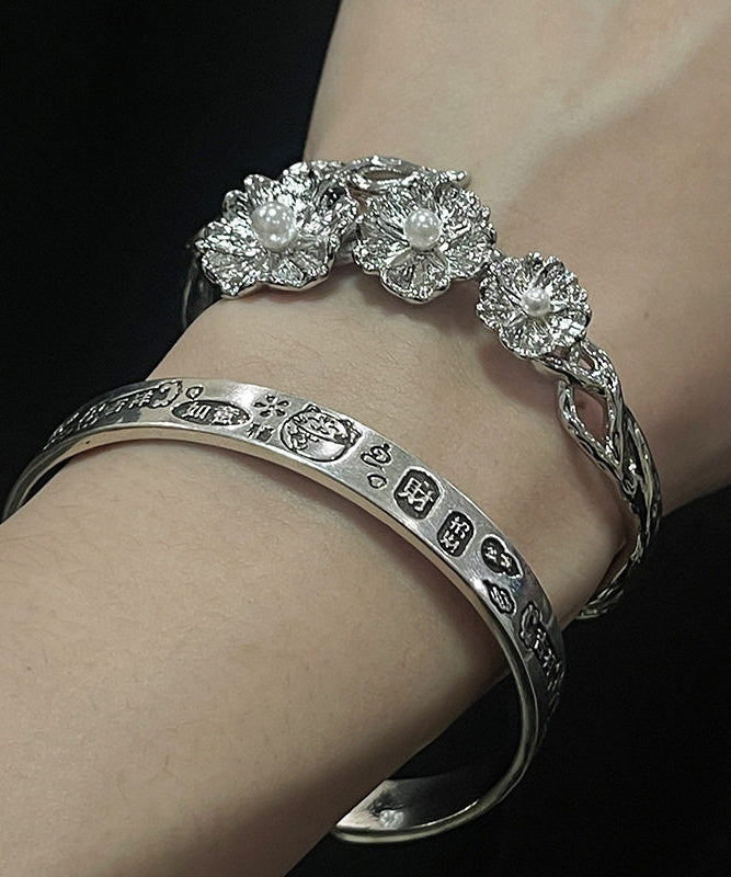 Fine Silk Sterling Silver Pearl Floral Asymmetrical Wrinkled Cross Cuff