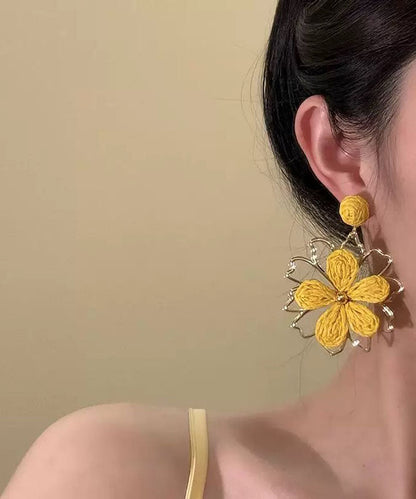 Stylish Yellow Alloy Weavin Hollow Out Floral Drop Earrings