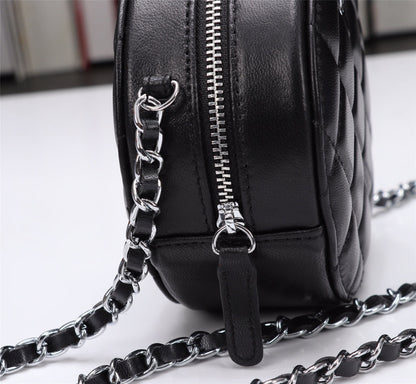 CHANEL Lambskin Quilted Round Clutch With Chain Black