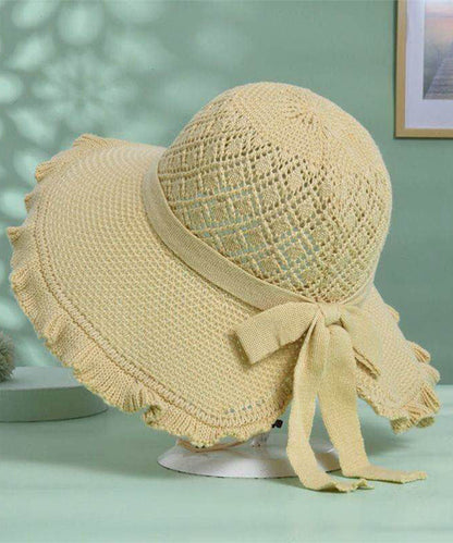 Stylish Khaki Hollow Out Bow Straw Woven Bucket Hat