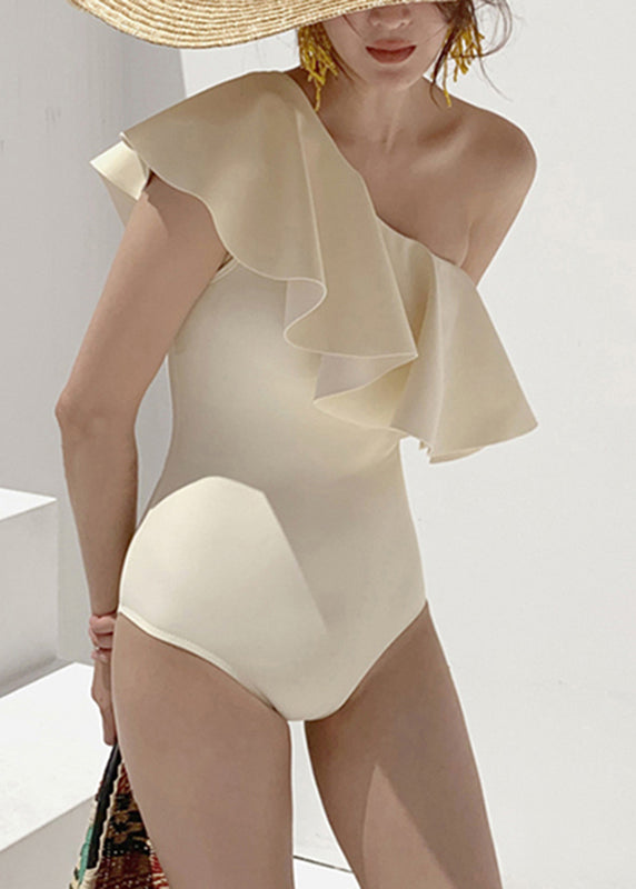 Trendy Beige One Shoulder Ruffled Patchwork Cut Out Bodysuits
